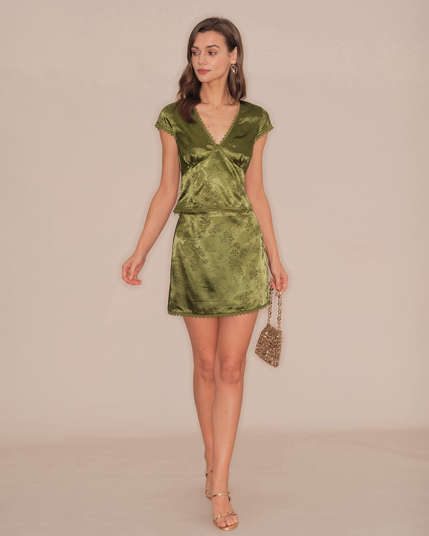 Grüner Minirock aus Satin mit Blumenmuster