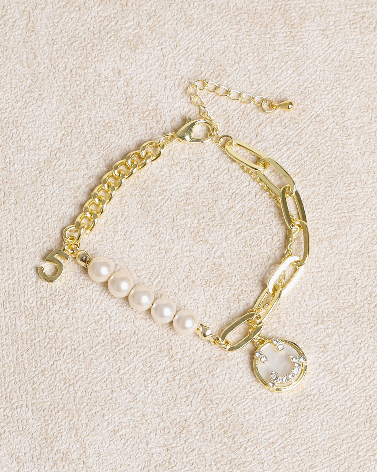 Armband aus Goldlegierung mit Perle