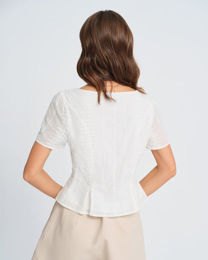 Weiße Bluse mit Blumenmuster und Struktur