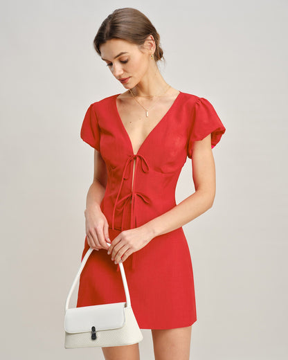 Camicetta con scollo a V rossa e fiocco