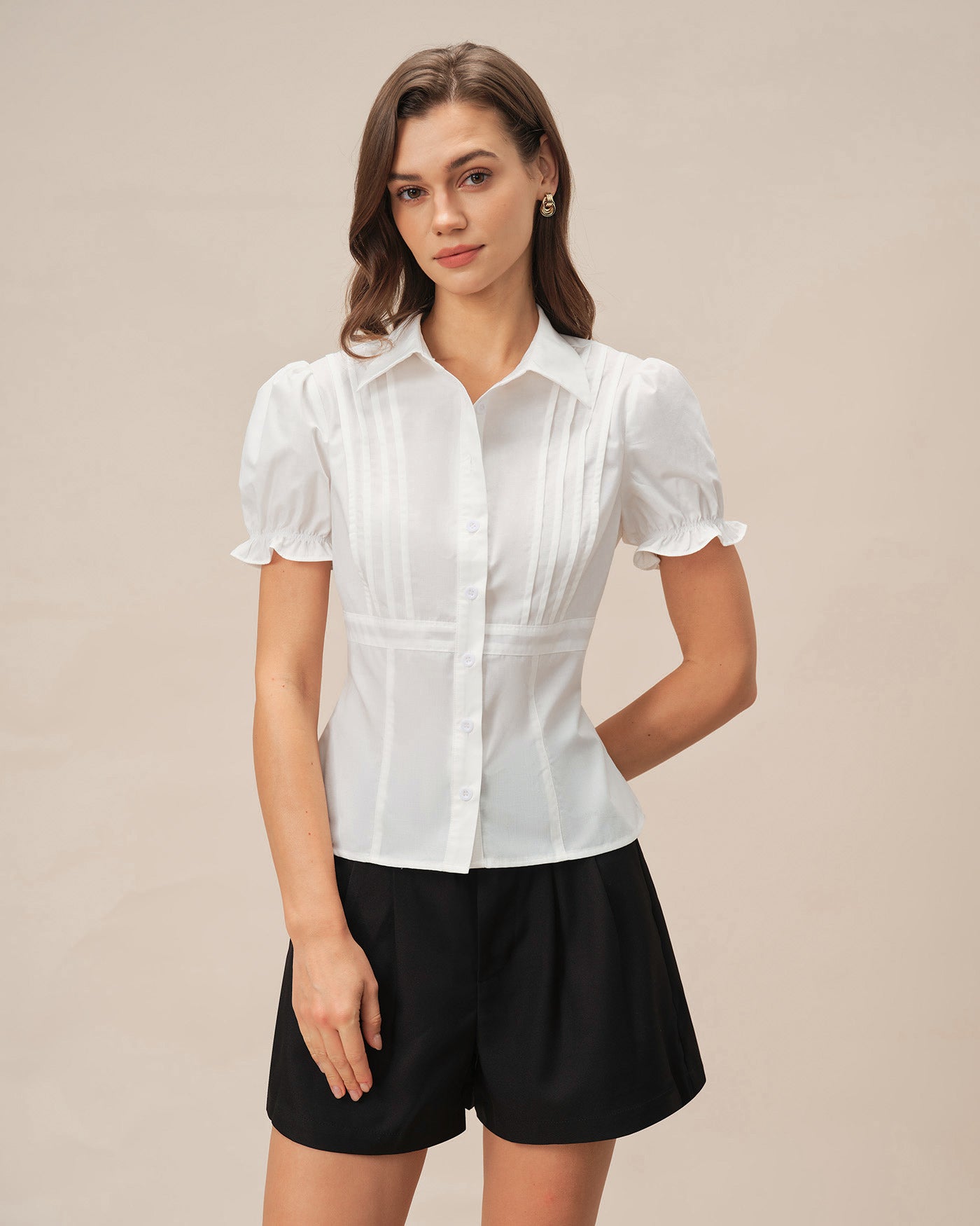 Weiße Bluse mit Puffärmeln und Kragen