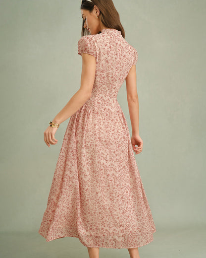 Rosa Maxikleid mit Blumenmuster und Stehkragen