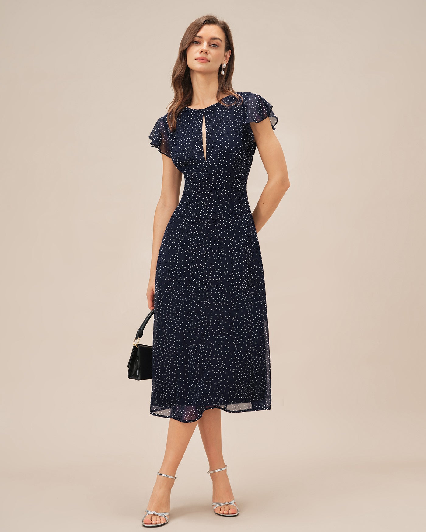 Blaues gepunktetes Midikleid