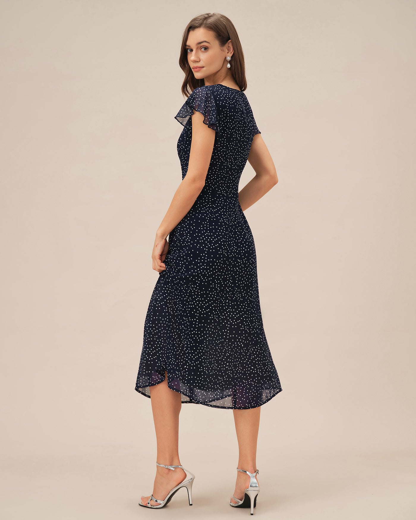 Blaues gepunktetes Midikleid