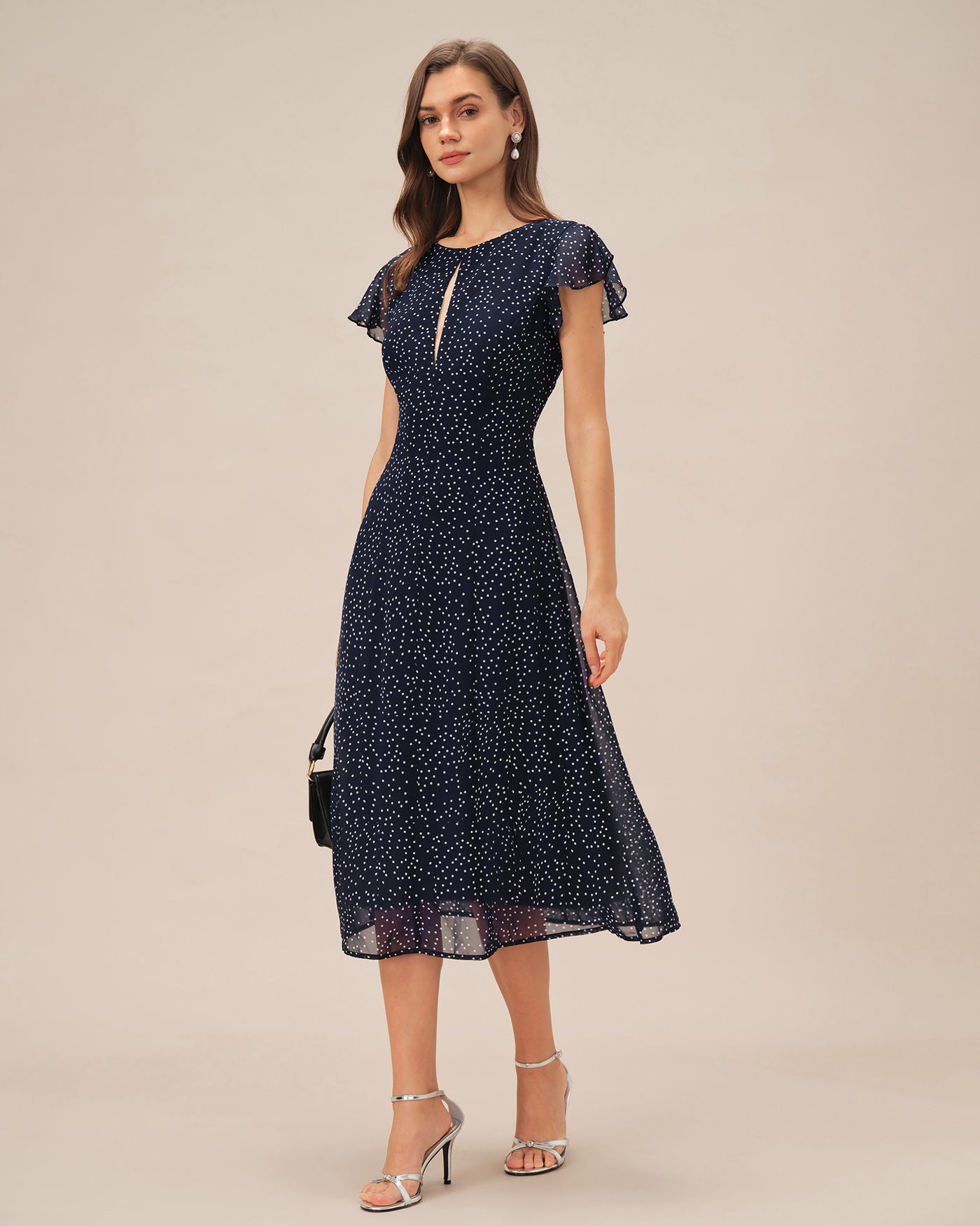 Blaues gepunktetes Midikleid