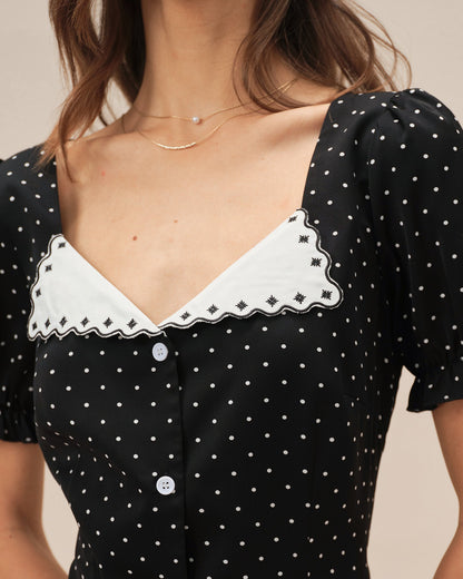Schwarzes gepunktetes Mini-Kleid mit V-Ausschnitt