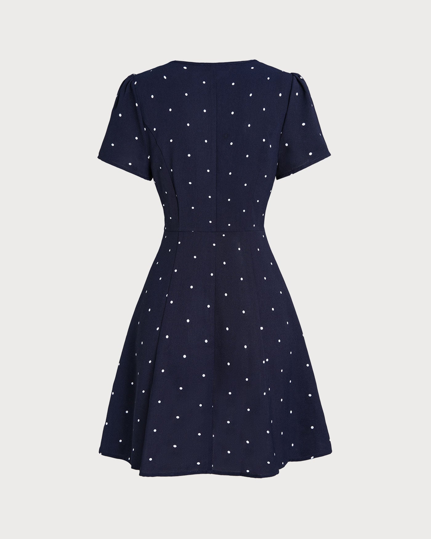 Blaues Mini-Kleid mit V-Ausschnitt, gepunktet und geknöpft