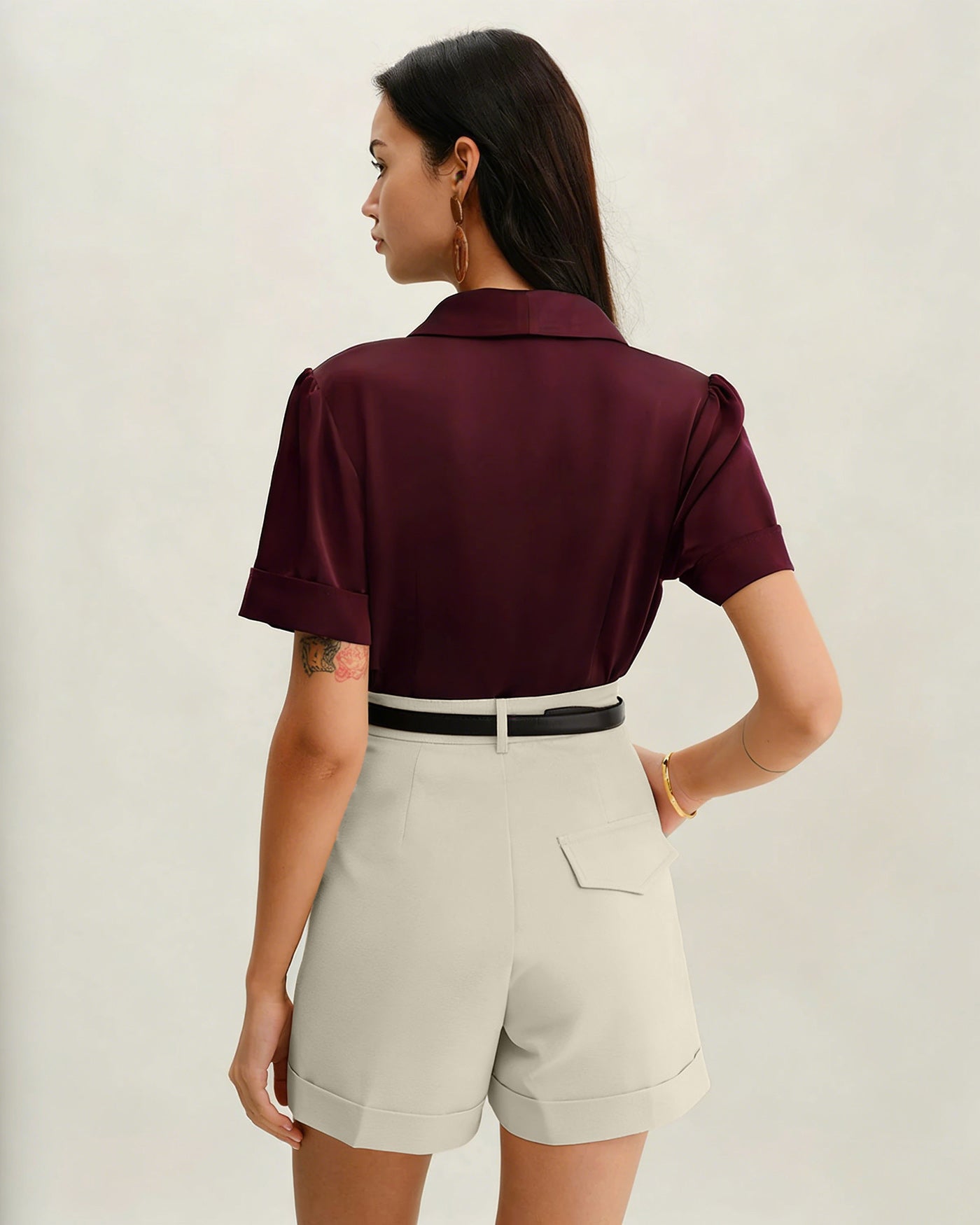 Pantaloncini grigi con cerniera e cintura