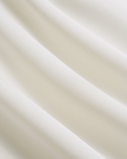 Aprikotfarbenes T-Shirt mit V-Ausschnitt und Knöpfen